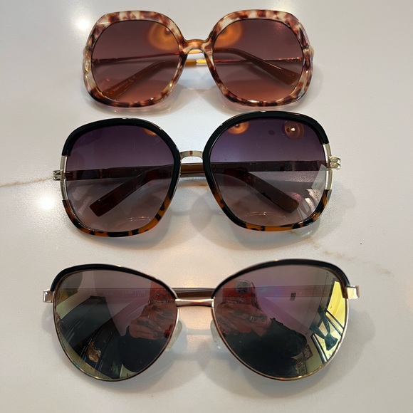 Pick any random 2 pairs of designer sunglasses for $25. - Picture 1 of 2